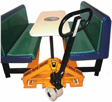 The cart has specially designed attachments to grip the frames of our booths and easily move them.